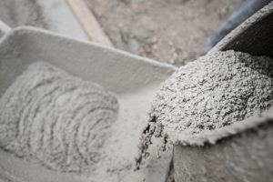 Cement in wheelbarrow at construction site.